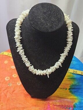 Hawaiian-style Puka White surfer necklace featuring Irregular Shells